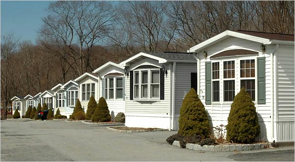 Row of white mobile homes